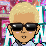 �߂���