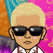�߂���