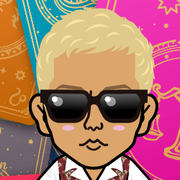 �߂���